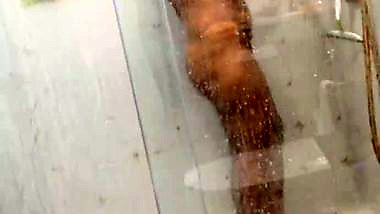 Desi girl under shower naked bath caught on camera