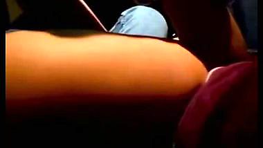 Outdoor sex of a guy sucking a girl’s boobs in a car